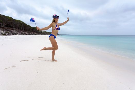 Patriotic aussie girl on beach 