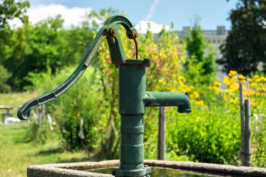 Manual water pump at Klenze Park in Ingolstadt