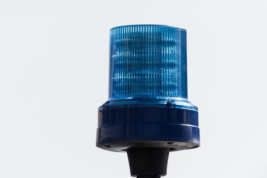 Detail shot of a blue light on a police car