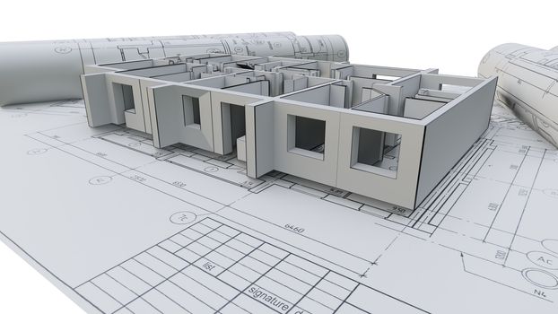 Built walls of a house on construction drawings
