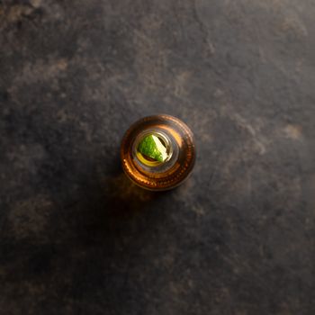 Bottle of beer with lime, flat lay