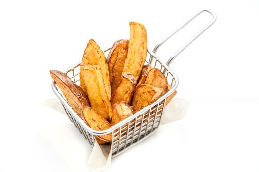 French fries in a metallic stainless steel basket