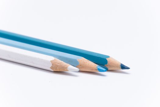 Crayons colored pencil in different colors crayon white blue