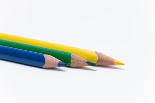 Crayons colored pencil in different colors crayon yellow green blue