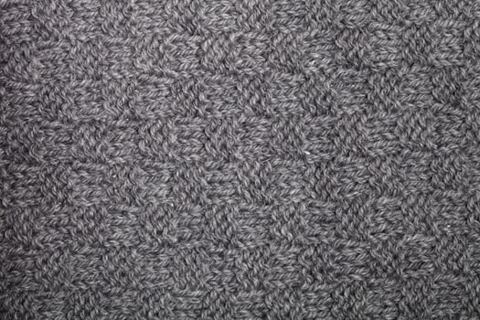 Knitted grey scarf texture 