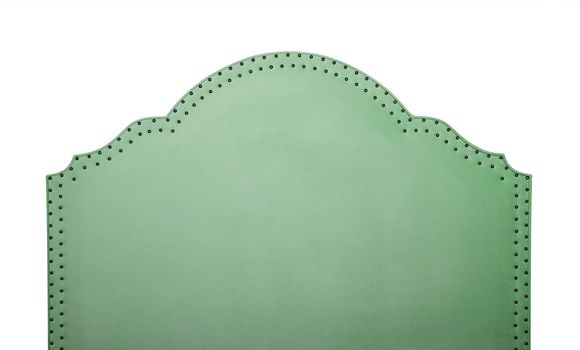 Green soft velvet bed headboard isolated on white