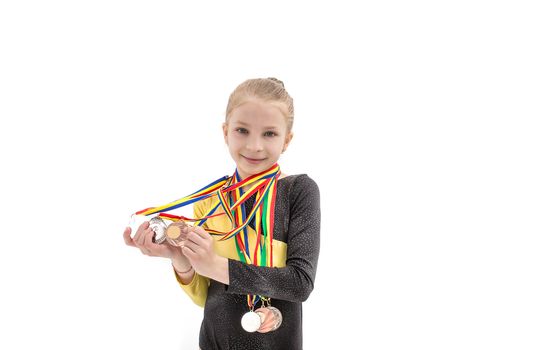 Acrobatics girl portrait with many medal on neck isolated on whi