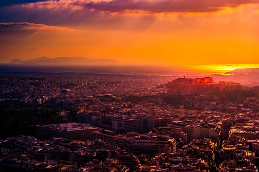 Athens skyline sunset viewed from Mt Lykavitos with Acropolis, Greece.