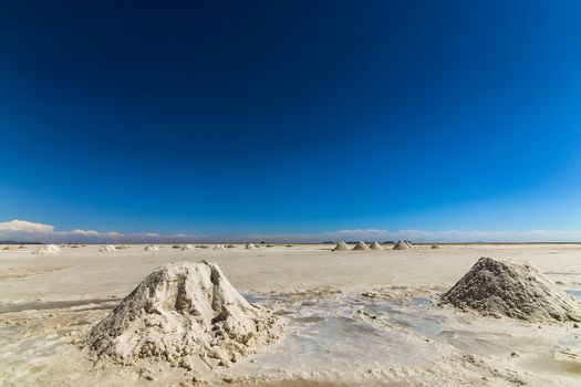 Piles of salt at Salar de Uyuni, Bolivia