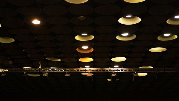 Spot lights in cinema hall on ceiling