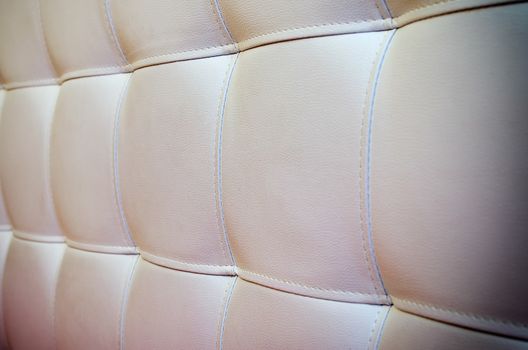 Tufted white leather headboard texture for background with vigne