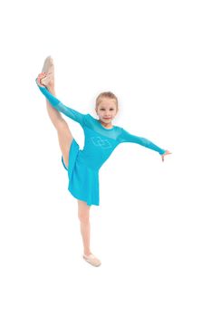Gymnastic girl with leg up isolated on white background