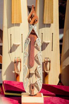 Set of models of musical instruments kemancha made of wood