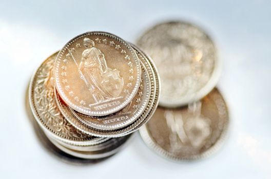 Swiss Franc coins stack
