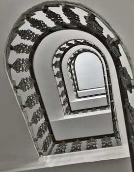 Spiral staircase in a residential house in Wien, view from below