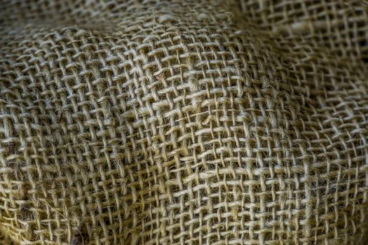 macro closeup of a jute jute fabric, sackcloth texture, old vintage fabrics, burlap background