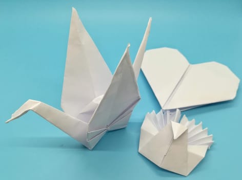 Origami figures made with white paper