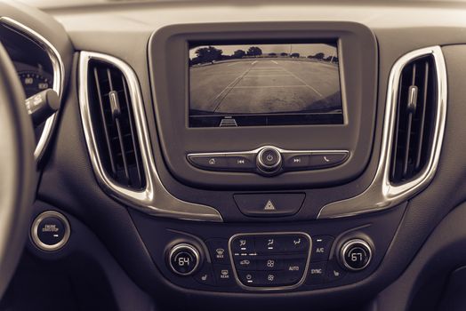 Filtered image rear view system monitor on dash camera backup at parking lots