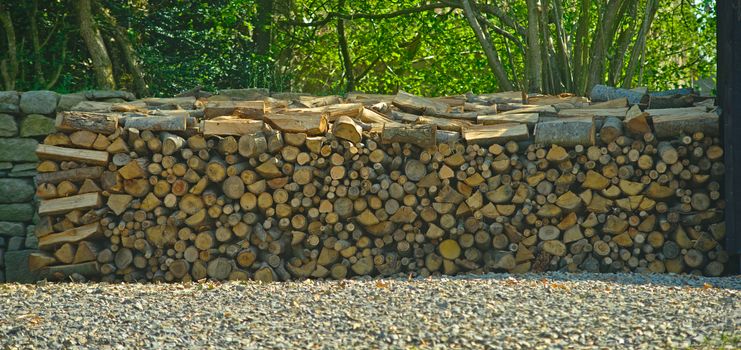Nicely assorted pile of wood for heating during winter