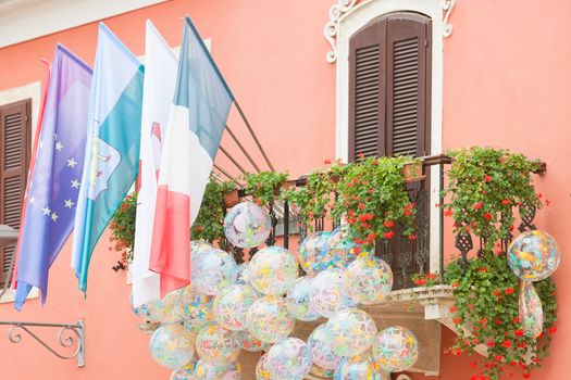 Novigrad, Istria, Croatia - Flags and beachballs at a picturesqu