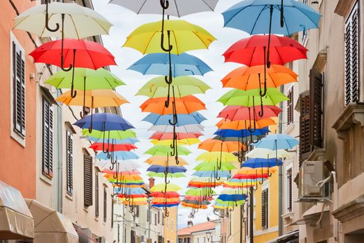Novigrad, Istria, Croatia - Picturesque colorful umbrellas in th