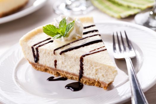 Slice Of Homemade Vanilla Cheesecake With Chocolate