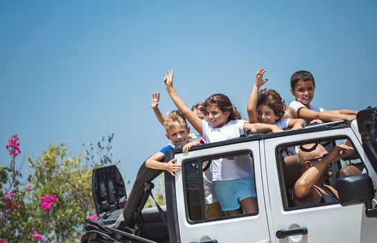 Happy children in the car