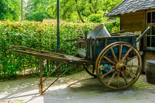 Vintage wooden cart, nostalgic agriculture equipment, old historic transportation