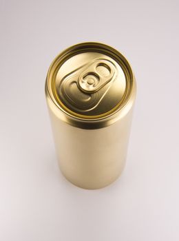 Gold can on white background