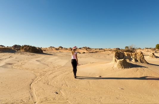 Woman in a desert landscape in outback Australia