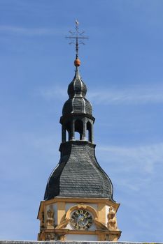 Church tower with a beautiful clock, and blue sky in the background    Kirchturm mit einer sch�nen Uhr,und blauem Himmel im Hintergrund 
