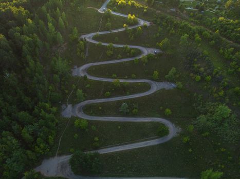 Aerial top vew of winding road in the city