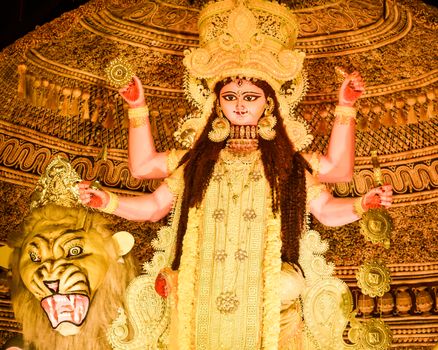 Kolkata West Bengal India October 2018 - Image of goddess devi Maa Durga or Parvati or Uma, wife of Lord Shiva in jewelery and Ceremonial make up during famous Durga Puja (Durgotsava) annual festival.