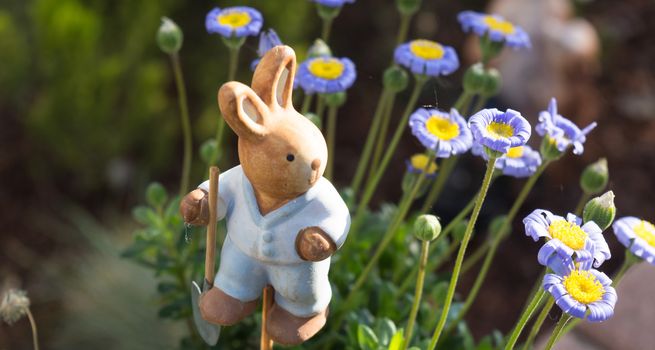 Easter decoration flowers decorated with a small wooden bunny
