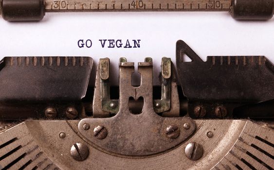 Go Vegan, written on an old typewriter