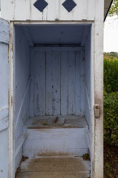 Rural outbuildings. A typical old fashioned WC, outhouse on an old farm