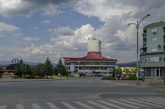 A residential district of contemporary macedonian  houses and Cultural House in  town Delchevo among Maleshevo and Osogovo mountains