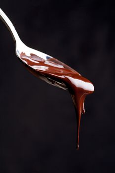 Close Up Of A Spoon Full Of Chocolate