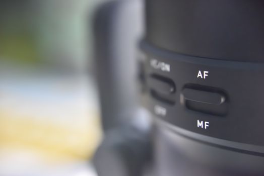 selective focus on switch of auto and manual focus on the lense