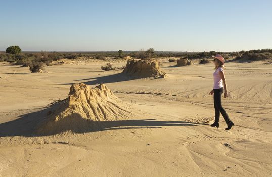 Woman in a desert landscape