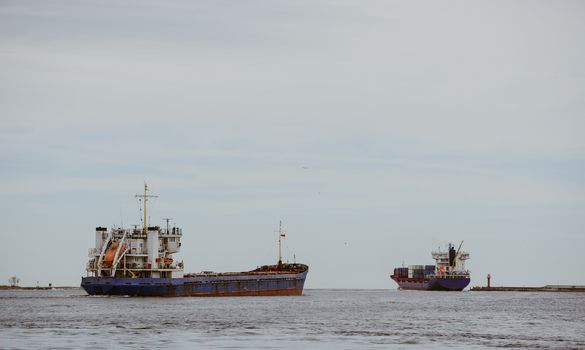 Transport vessels depart from the port to the open Baltic Sea