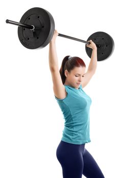 Young girl doing shoulder press with barbell