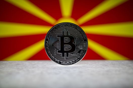 Physical silver version of Bitcoin (BTC) and Macedonia Flag on t