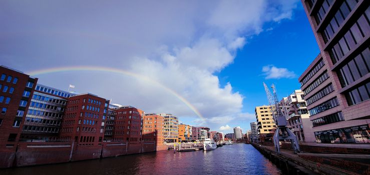 Beautiful rainbow over Hamburg canal