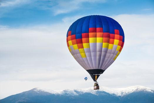 Multicolored Balloon in the blue sky