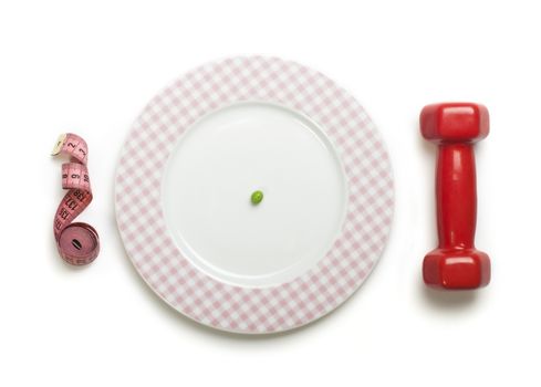 Plate with one peas. Dumbbell and centimeter measure. 