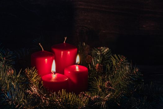 Two Advent burning candles, christmas decoration, postcard concept