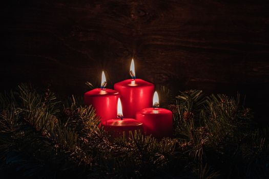 Four Advent burning candles, christmas decoration, postcard concept