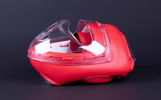 Red boxing helmet, modern headgear