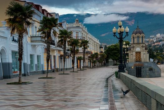 Embankment of the Russian city of Yalta in the autumn afternoon,